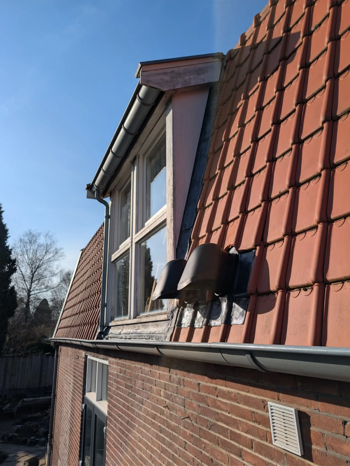 Voorbeeld van een schuin pannendak